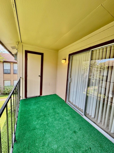 9229 Imogene Street, Unit 9229 Houston, TX 77036 - Photo 12 of 24 a view of an entryway with a garden
