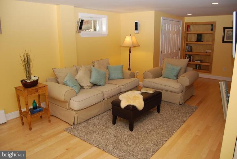 1365 Rittenhouse Street Northwest Washington, DC 20011 - Photo 20 of 25 Family Room with Wall-Mounted TV & Speaker System.