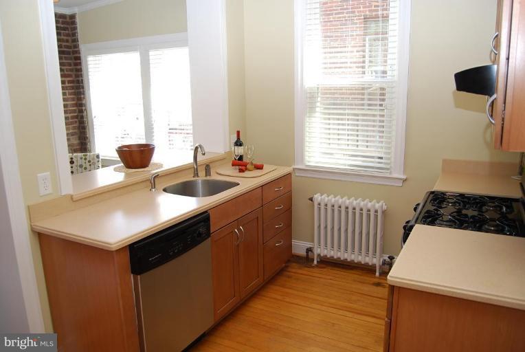 1365 Rittenhouse Street Northwest Washington, DC 20011 - Photo 24 of 25 More Kitchen with Lots of Windows and Sunshine.