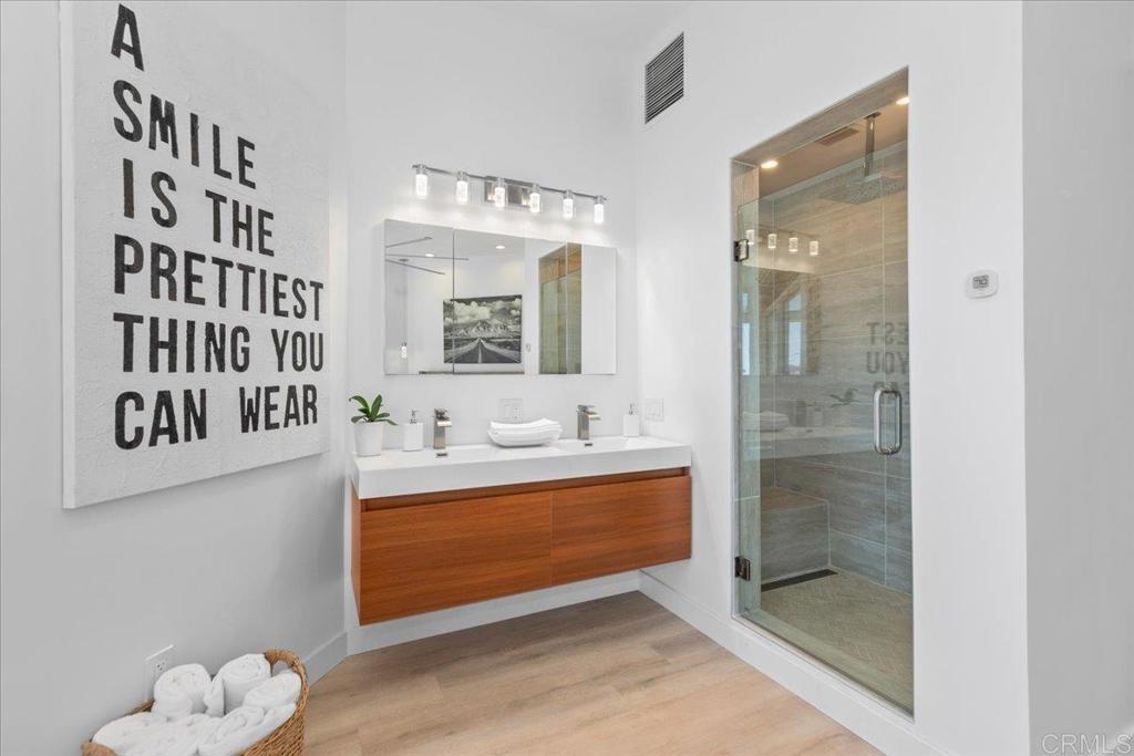 1645 Noma Lane Encinitas, CA 92024 - Photo 16 of 50 Primary shower and sink area