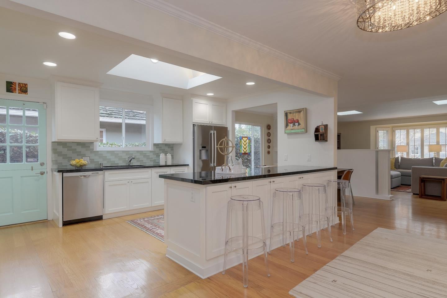 311 Concord Drive Menlo Park, CA 94025 - Photo 4 of 15 a kitchen with granite countertop a sink and counter top space