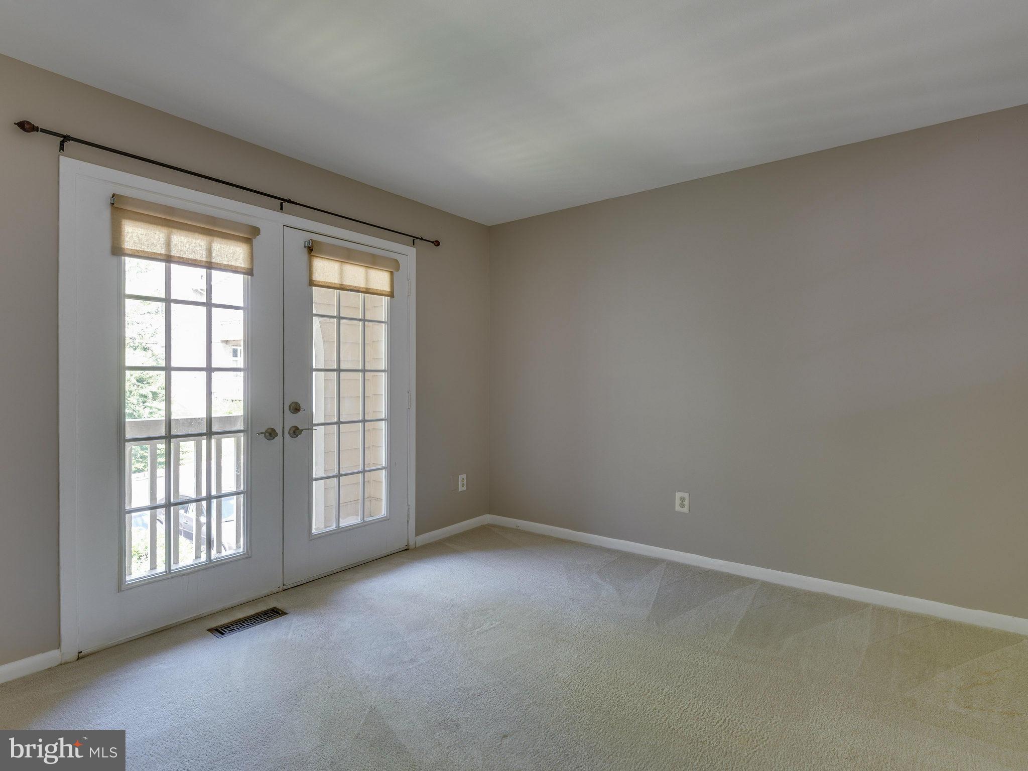 11131 Lake Chapel Lane Reston, VA 20191 - Photo 21 of 30 an empty room with windows