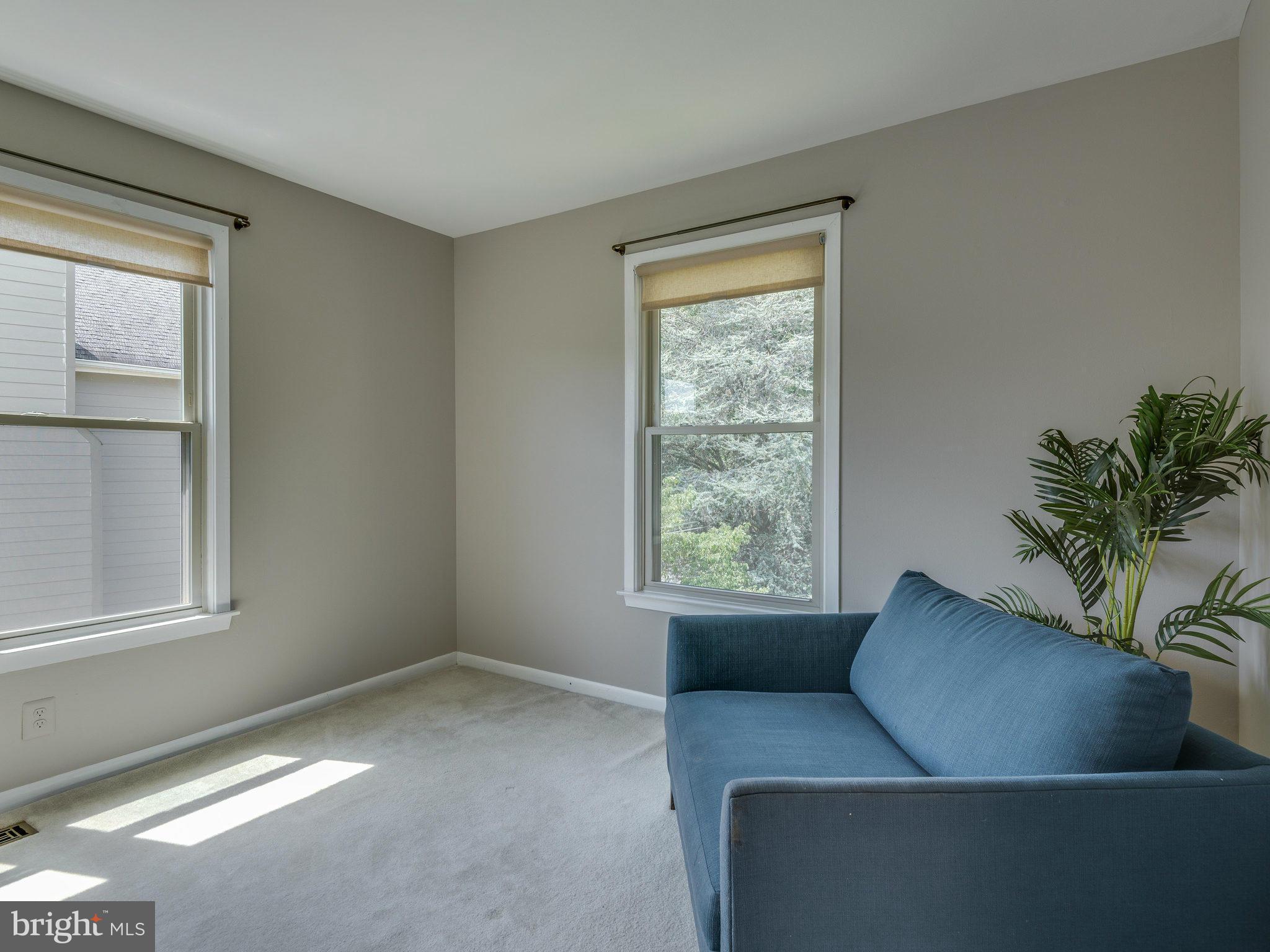 11131 Lake Chapel Lane Reston, VA 20191 - Photo 22 of 30 a living room with furniture and a window