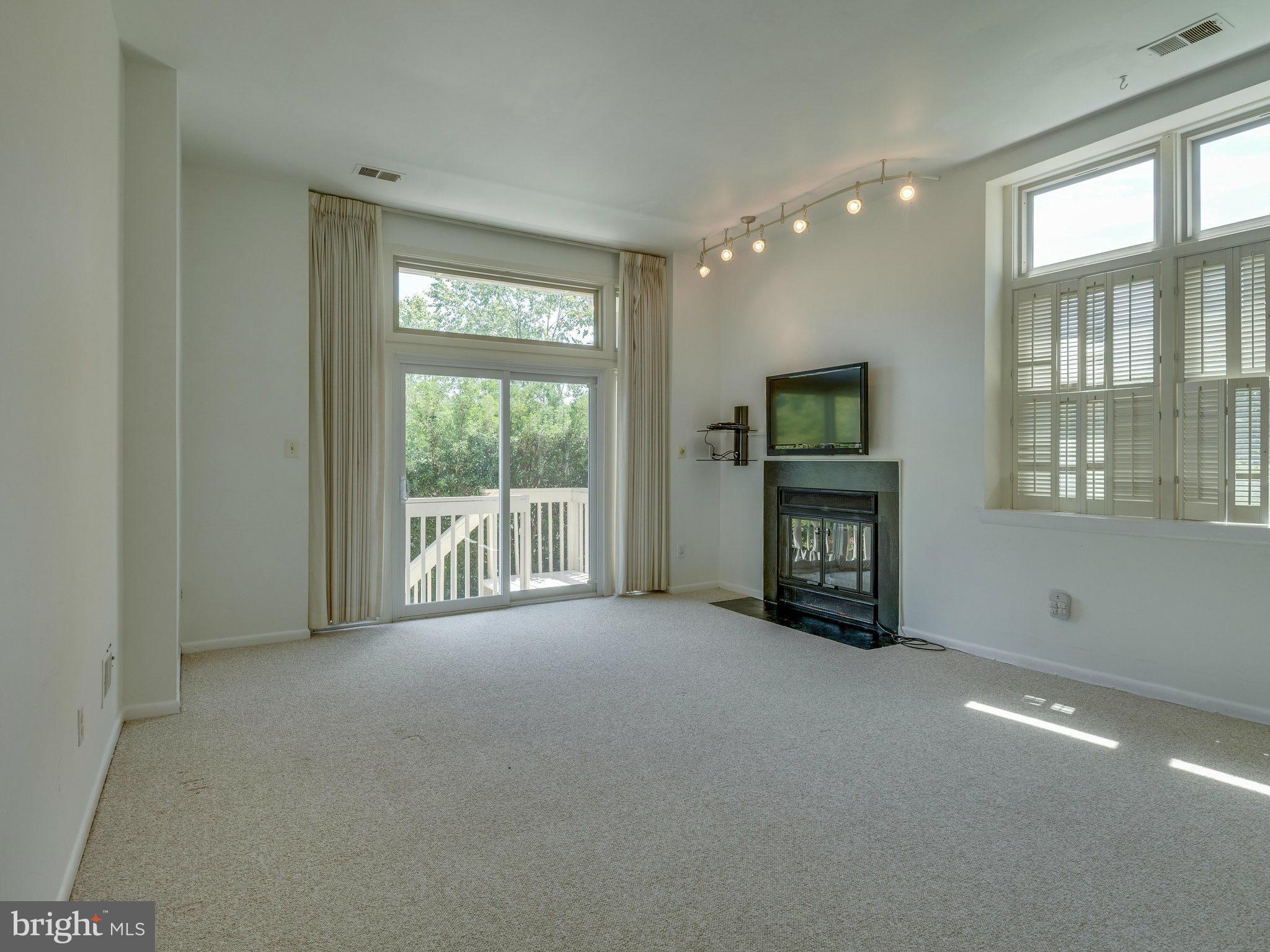 11131 Lake Chapel Lane Reston, VA 20191 - Photo 25 of 30 a view of an empty room with a window