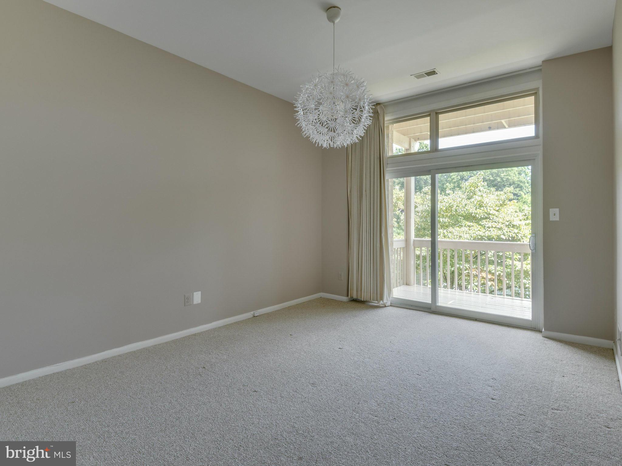 11131 Lake Chapel Lane Reston, VA 20191 - Photo 26 of 30 a view of an empty room with a window