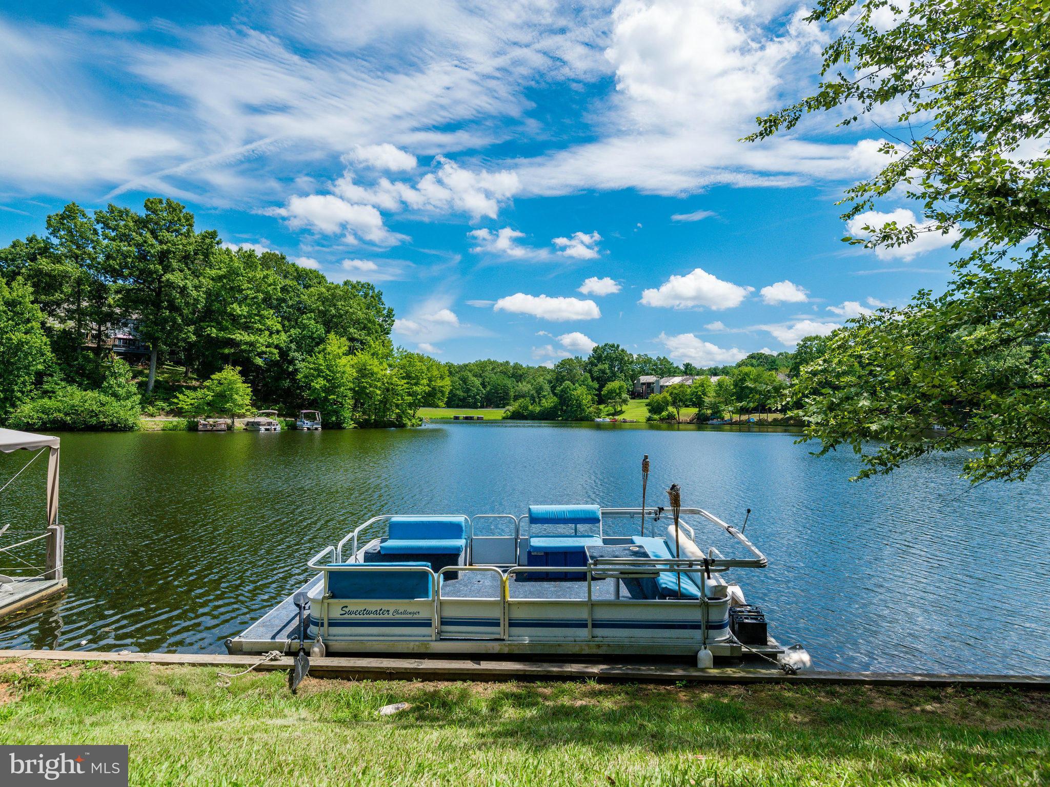 11131 Lake Chapel Lane Reston, VA 20191 - Photo 28 of 30 a view of a lake with houses in the back