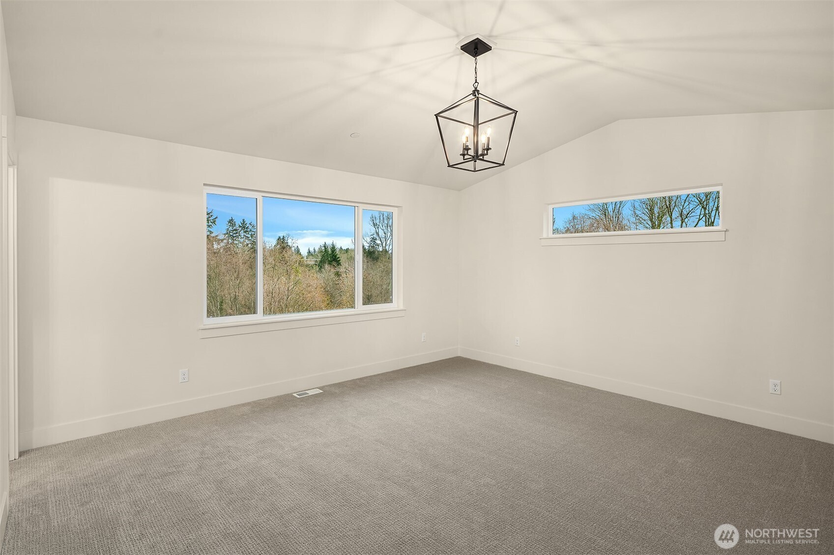 8409 Northeast 156th Street Kenmore, WA 98028 - Photo 10 of 16 a view of a room with windows