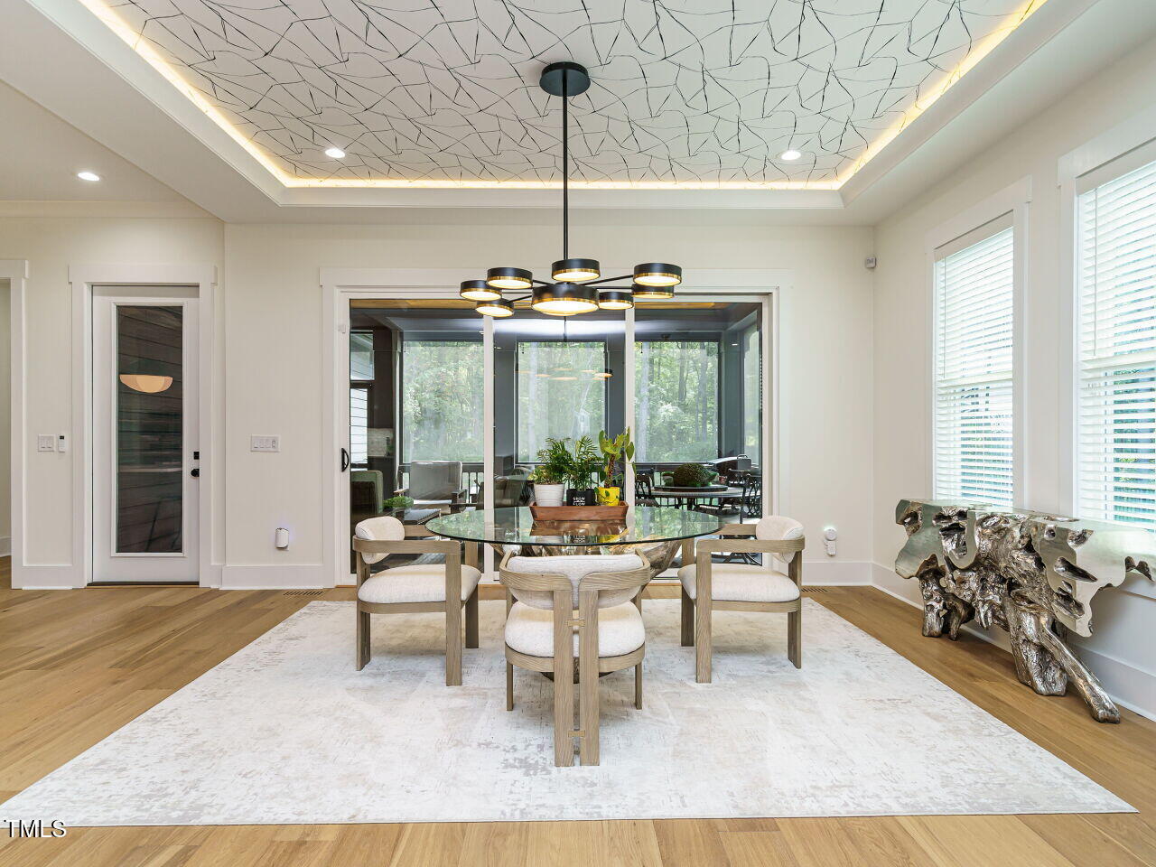 6428 Prescott Chase Drive Rolesville, NC 27571 - Photo 16 of 45 a living room with furniture chandelier and a large window