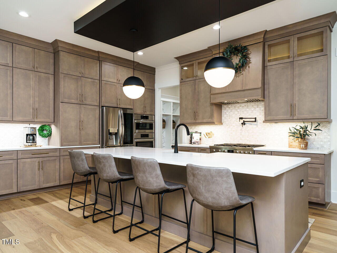 6428 Prescott Chase Drive Rolesville, NC 27571 - Photo 3 of 45 a kitchen with a sink and cabinets