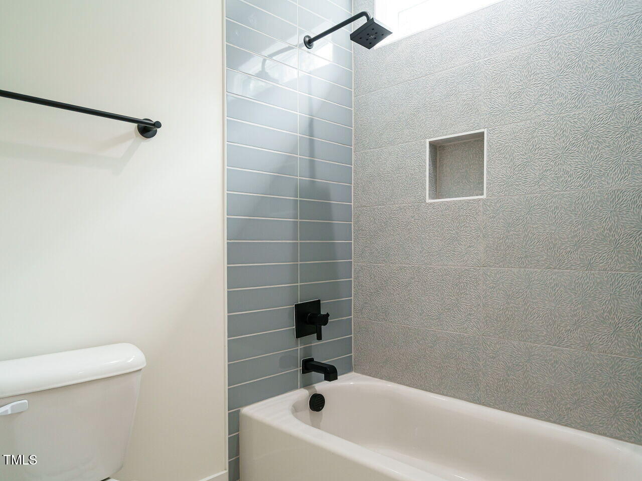 6428 Prescott Chase Drive Rolesville, NC 27571 - Photo 31 of 45 a bathroom with a bathtub and a toilet