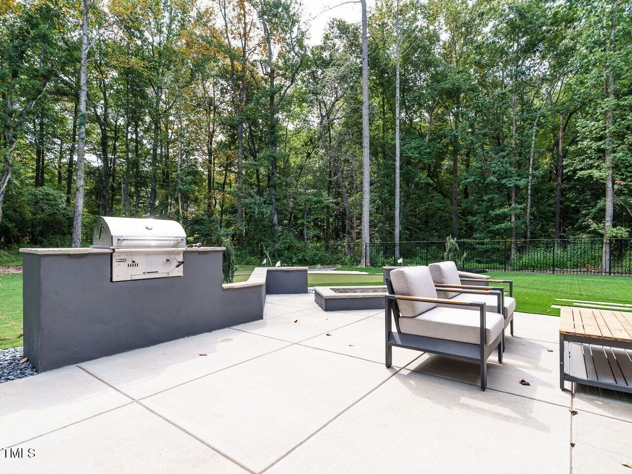 6428 Prescott Chase Drive Rolesville, NC 27571 - Photo 38 of 45 a view of a bench in the garden