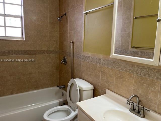 4250 West 11th Lane, Unit 43 Hialeah, FL 33012 - Photo 25 of 31 a bathroom with a sink toilet and shower