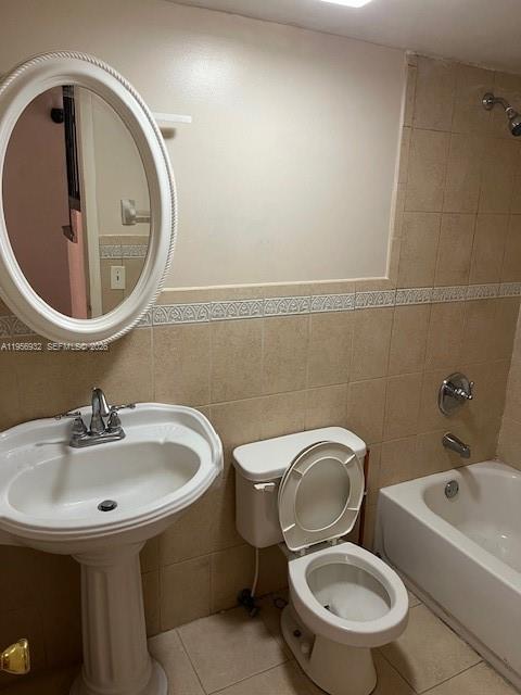 4250 West 11th Lane, Unit 43 Hialeah, FL 33012 - Photo 6 of 31 a bathroom with a toilet and a sink