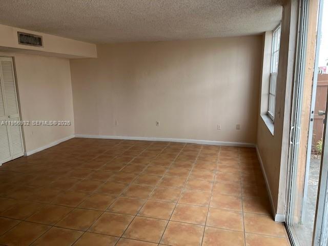 4250 West 11th Lane, Unit 43 Hialeah, FL 33012 - Photo 8 of 31 a view of an empty room and window