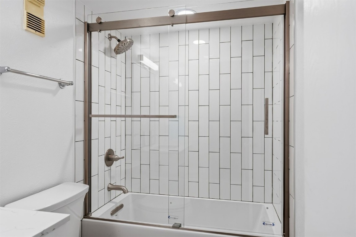 4200 Lodgepole Circle, Unit 306 Silverthorne, CO 80498 - Photo 12 of 26 a bathroom with a shower and a bathtub