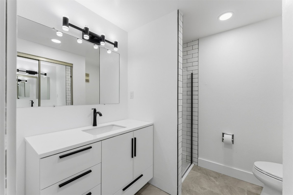 4200 Lodgepole Circle, Unit 306 Silverthorne, CO 80498 - Photo 15 of 26 a bathroom with a sink and a mirror