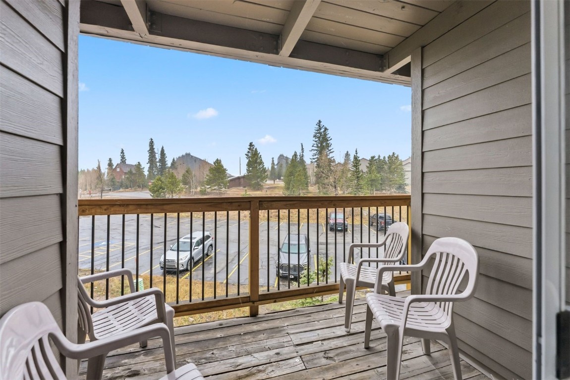 4200 Lodgepole Circle, Unit 306 Silverthorne, CO 80498 - Photo 8 of 26 a view of a chair and table in the balcony