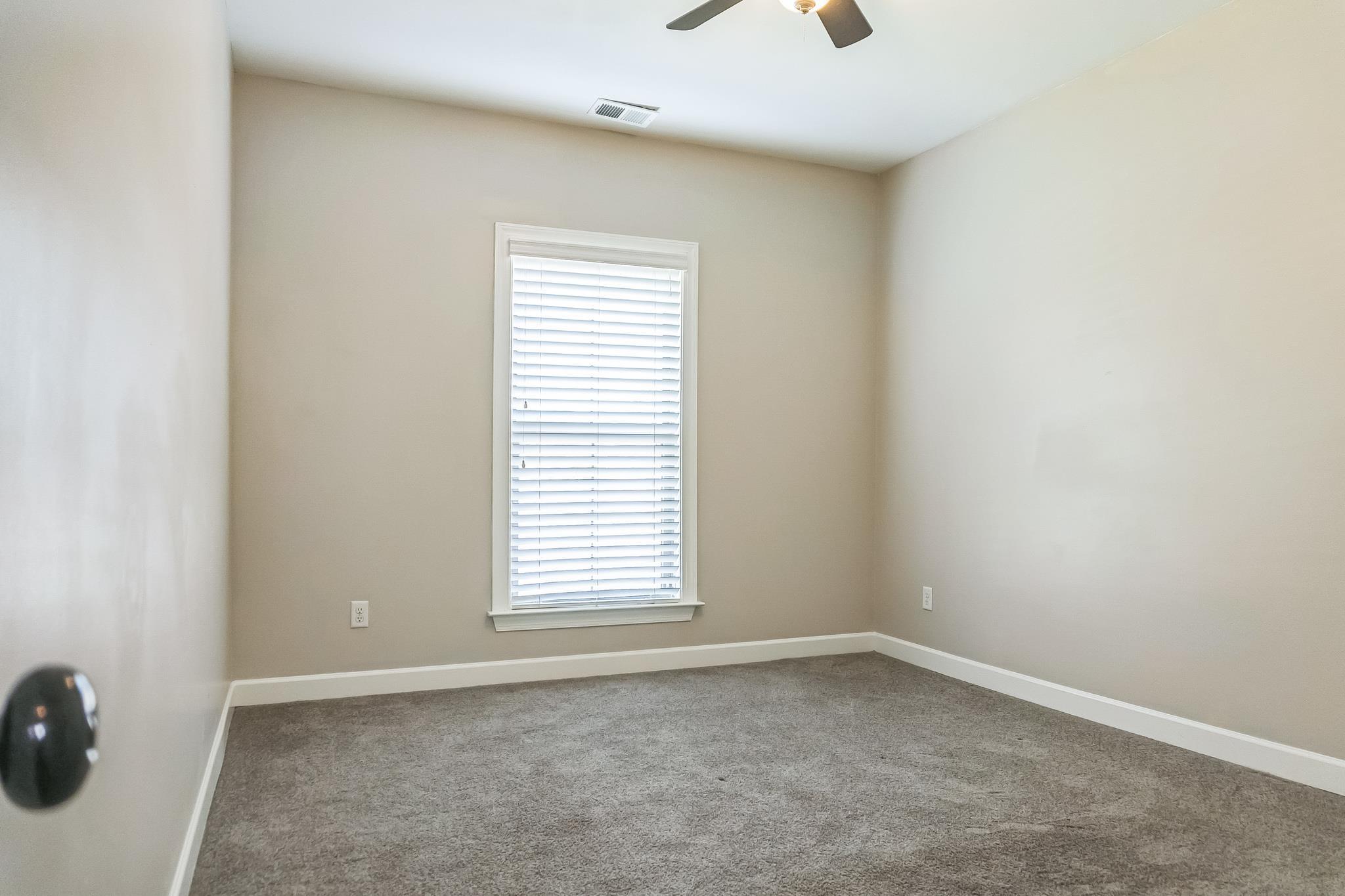 4948 Grace View Lane Bartlett, TN 38135 - Photo 15 of 21 an empty room with a window