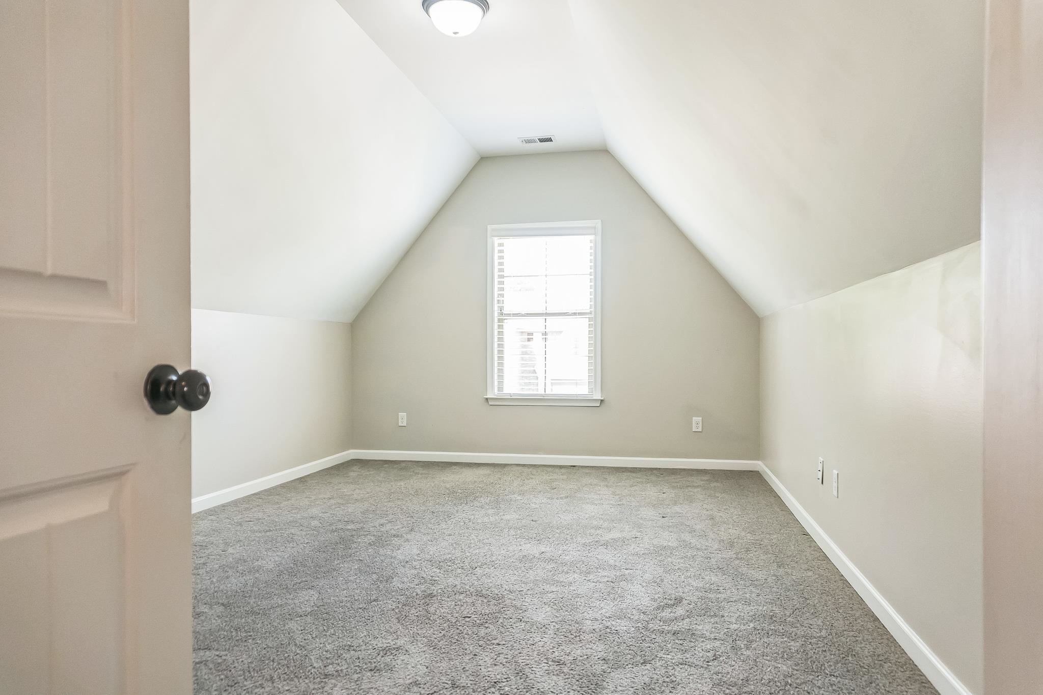 4948 Grace View Lane Bartlett, TN 38135 - Photo 17 of 21 an empty room with a empty space and windows