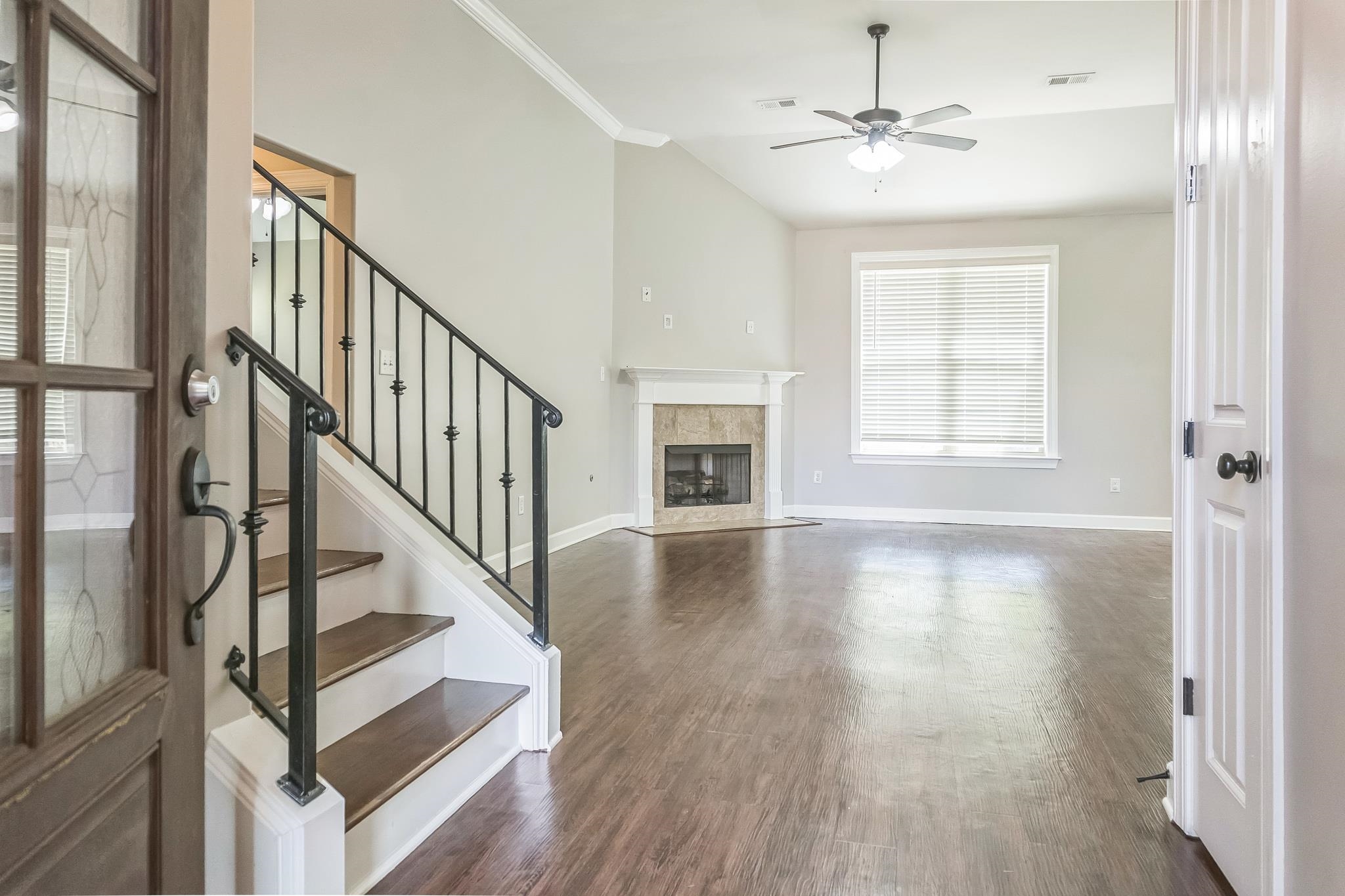 4948 Grace View Lane Bartlett, TN 38135 - Photo 2 of 21 a view of an entryway with wooden floor and a front door