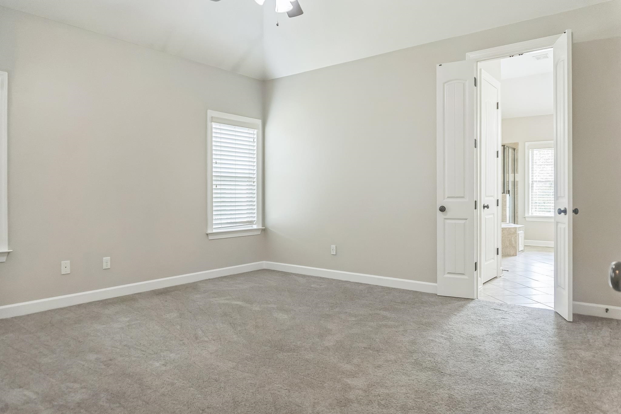 4948 Grace View Lane Bartlett, TN 38135 - Photo 10 of 21 an empty room with windows and closet