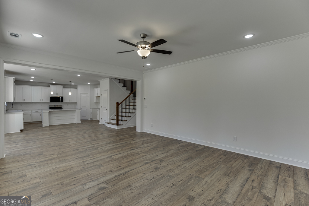 929 Lakeview Drive Commerce, GA 30529 - Photo 20 of 44 a view of an empty room with a kitchen
