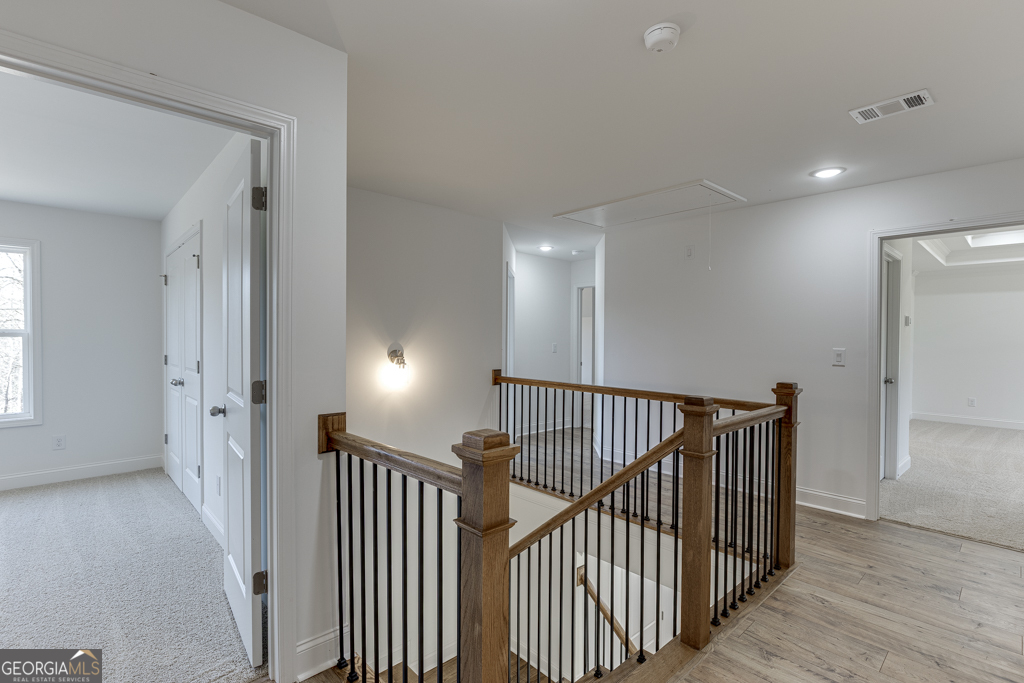 929 Lakeview Drive Commerce, GA 30529 - Photo 22 of 44 a view of a hallway with entryway and stairs