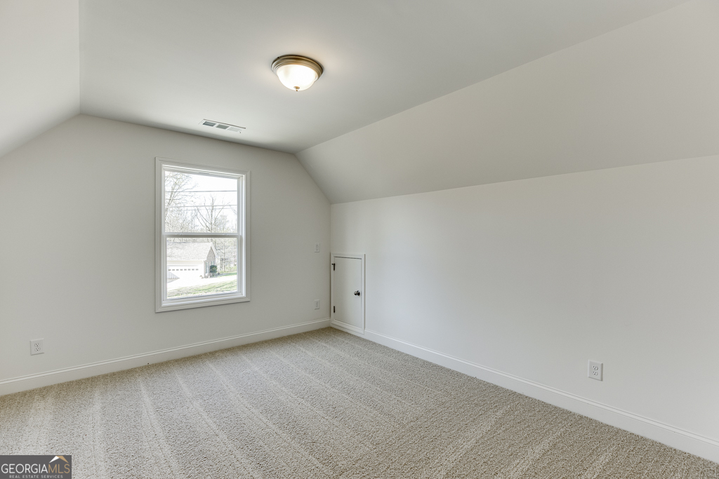 929 Lakeview Drive Commerce, GA 30529 - Photo 28 of 44 an empty room with a window