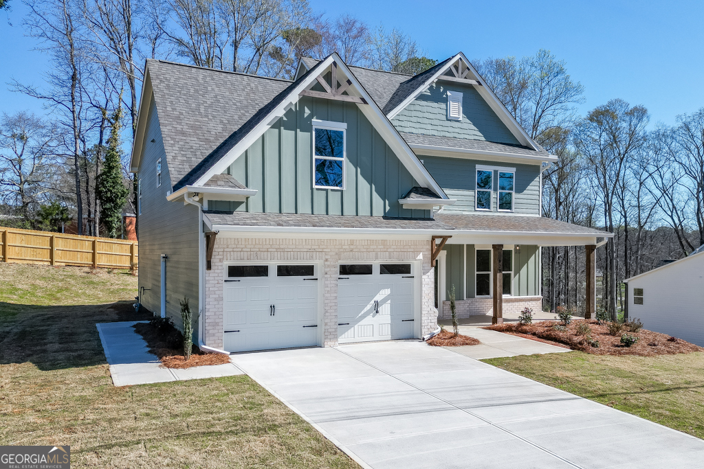 929 Lakeview Drive Commerce, GA 30529 - Photo 3 of 44 a front view of a house with garden
