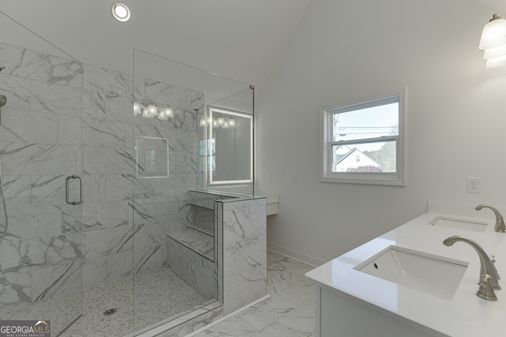 929 Lakeview Drive Commerce, GA 30529 - Photo 36 of 44 a bathroom with a sink a toilet and shower