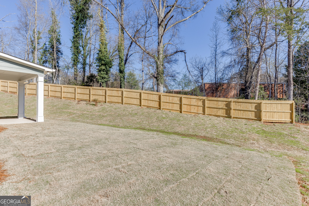 929 Lakeview Drive Commerce, GA 30529 - Photo 43 of 44 a view of backyard with wooden fence