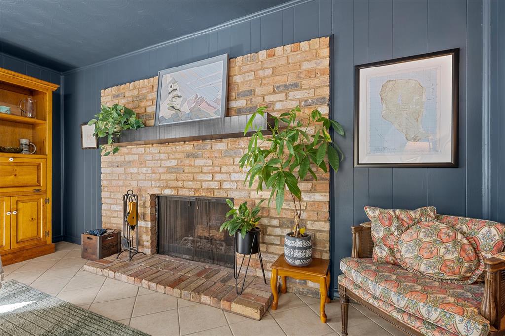 2216 Hermanson Drive Waco, TX 76710 - Photo 16 of 39 a living room with furniture and a fireplace
