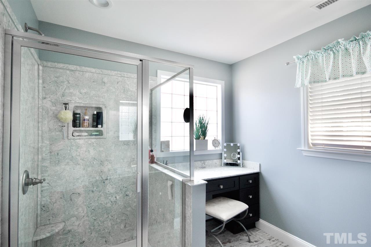 2128 Haig Point Way Raleigh, NC 27604 - Photo 20 of 30 New marble walk in shower and make up counter