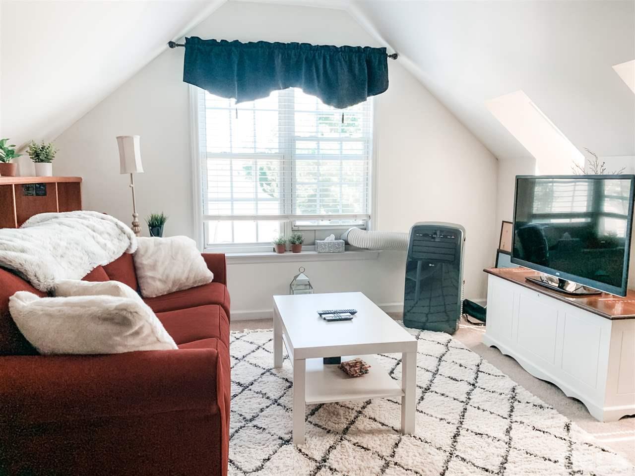 2128 Haig Point Way Raleigh, NC 27604 - Photo 25 of 30 3rd floor office/bonus room. Door to walk in attic in this room