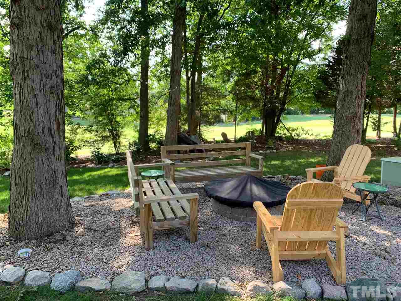 2128 Haig Point Way Raleigh, NC 27604 - Photo 28 of 30 Fire pit and benches convey.