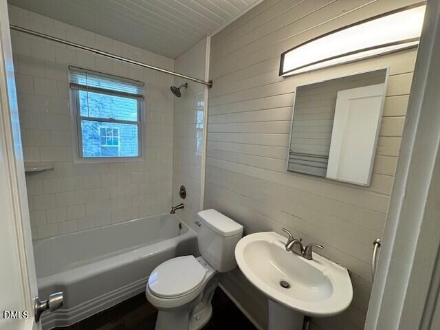1012 Berkeley Street Durham, NC 27705 - Photo 12 of 12 a bathroom with a sink toilet and shower