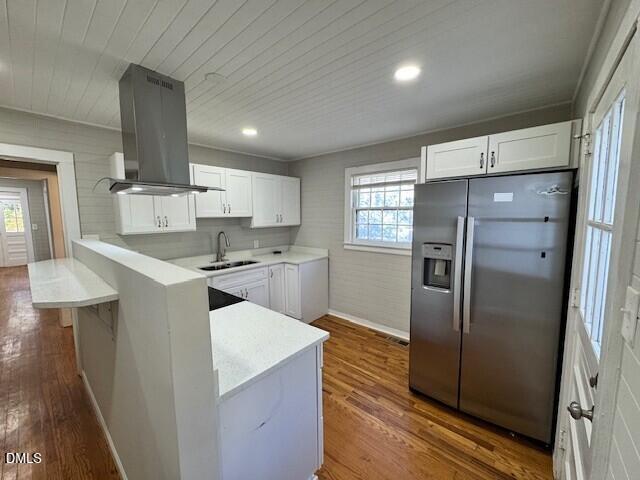 1012 Berkeley Street Durham, NC 27705 - Photo 3 of 12 a kitchen with a refrigerator sink and cabinets