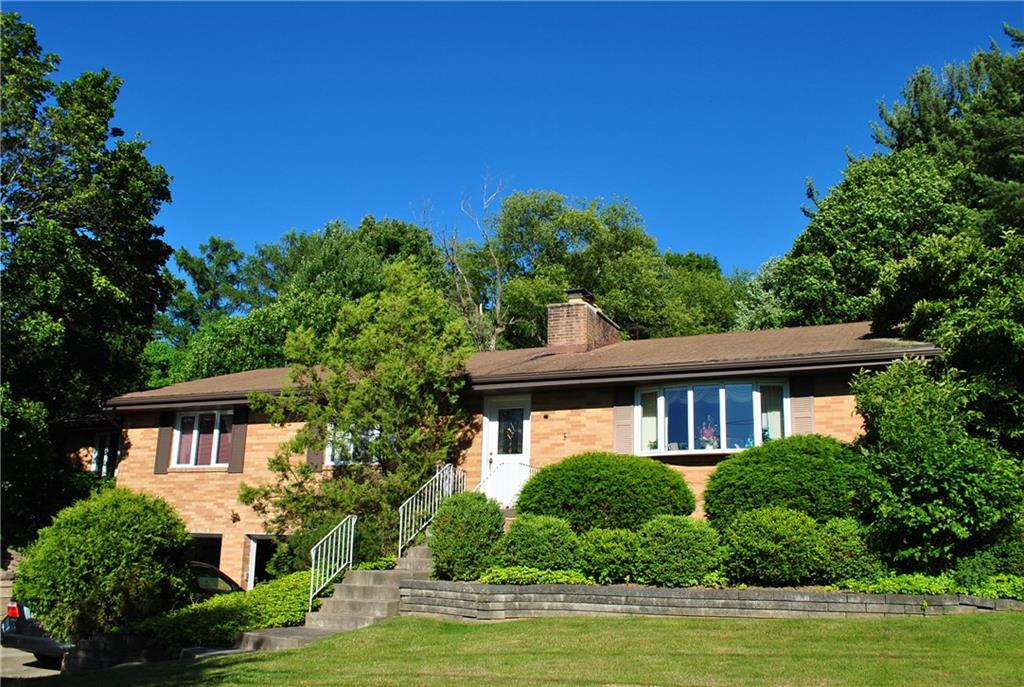 200 Rosscommon Road Wexford, PA 15090 - Photo 1 of 24 Welcome Home! This beautiful all brick 3 bedroom Ranch is spacious and bright! Mature landscaping with a nice level yard and a view you won't believe. 2 car garage and oh so convenient to Pittsburgh and Cranberry!