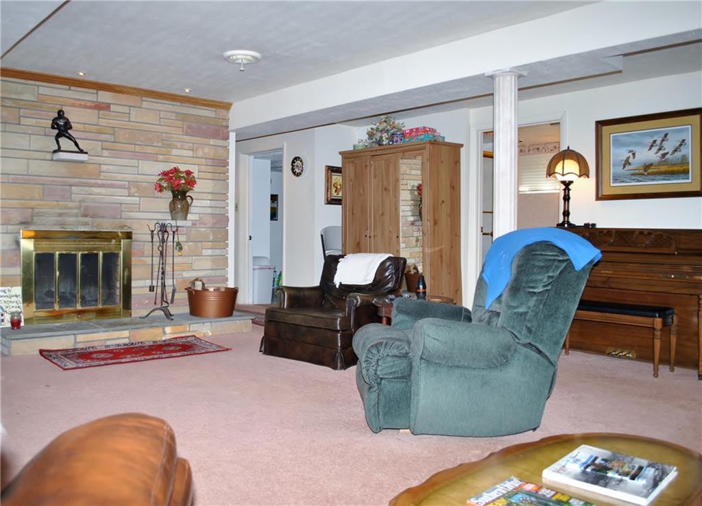 200 Rosscommon Road Wexford, PA 15090 - Photo 17 of 24 You and your family will spend most of your time in the lower level game room with wood burning fireplace and plenty of light. Full bathroom with a separate shower and tub are also located in the lower level!