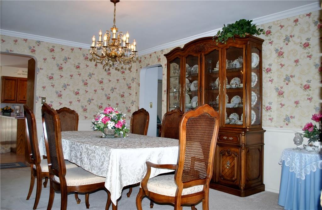 200 Rosscommon Road Wexford, PA 15090 - Photo 3 of 24 The dining room is just off the kitchen and will accommodate your dining room set and plenty of seats at the dinner table.