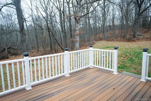 a view of a wooden roof deck