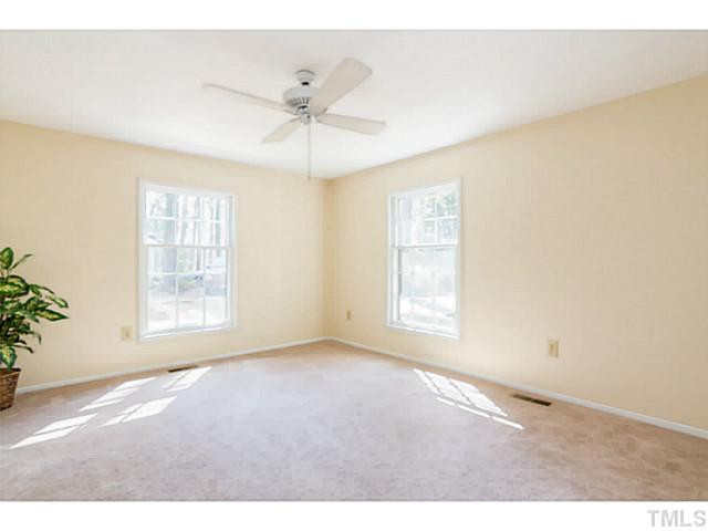 1317 Clermont Road Durham, NC 27713 - Photo 3 of 25 a view of an empty room with a window