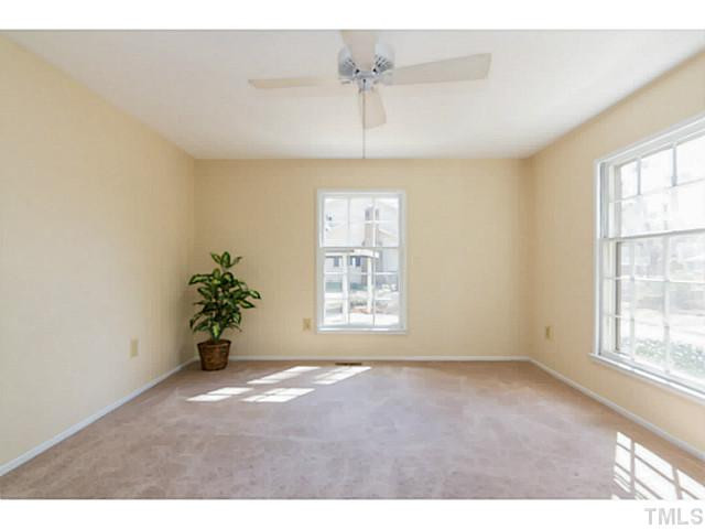1317 Clermont Road Durham, NC 27713 - Photo 4 of 25 a view of an empty room with a window
