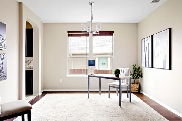 a room with furniture and a window