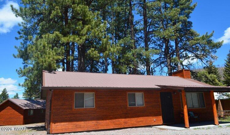 90 Main Street Greer, AZ 85927 - Photo 1 of 18 CABIN 90 PRIMARY