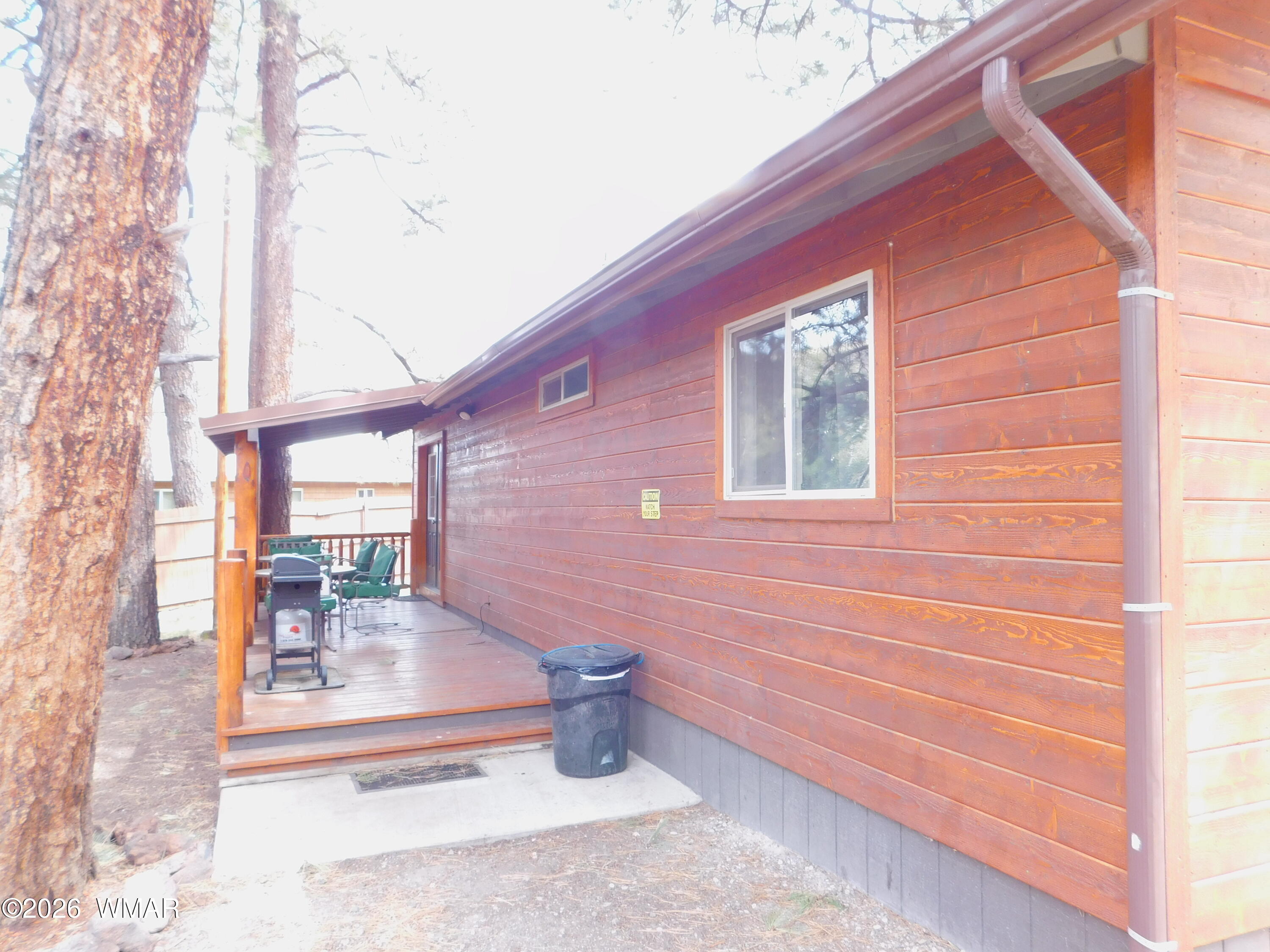 90 Main Street Greer, AZ 85927 - Photo 17 of 18 CABIN 90 BACK DECK 3