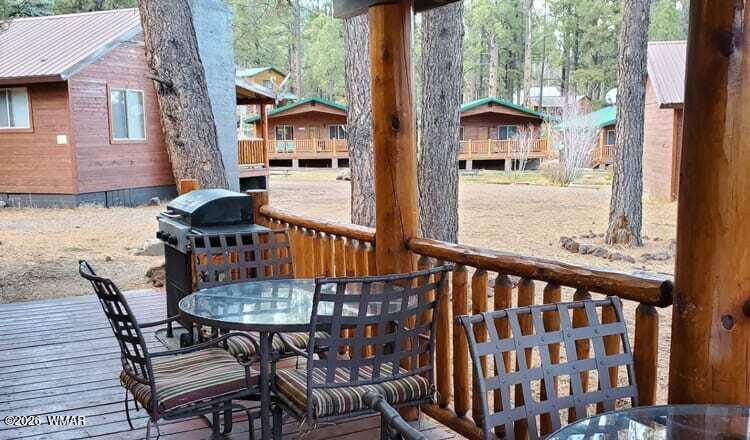 90 Main Street Greer, AZ 85927 - Photo 2 of 18 CABIN 90 DECK 1