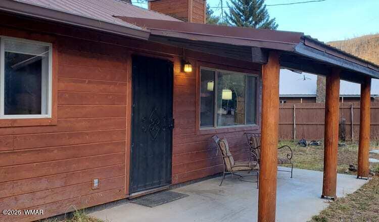 90 Main Street Greer, AZ 85927 - Photo 4 of 18 CABIN 90 FRONT PATIO