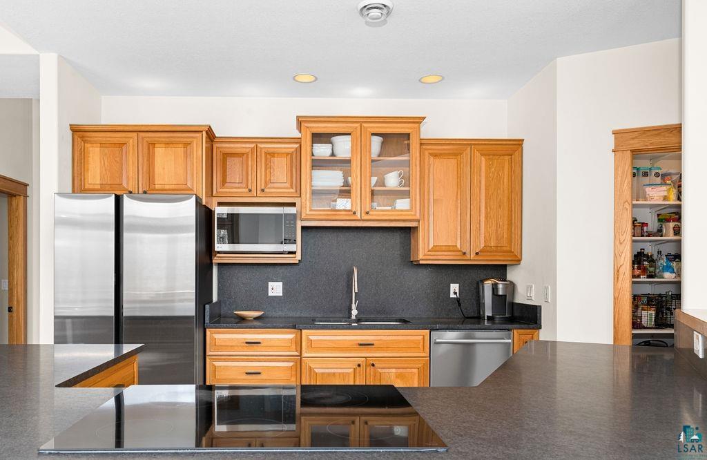 4856 Kingston Street Duluth, MN 55804 - Photo 10 of 88 Kitchen featuring a built-in stainless steel side-by-side refrigerator, stainless steel microwave, and stainless steel dishwasher