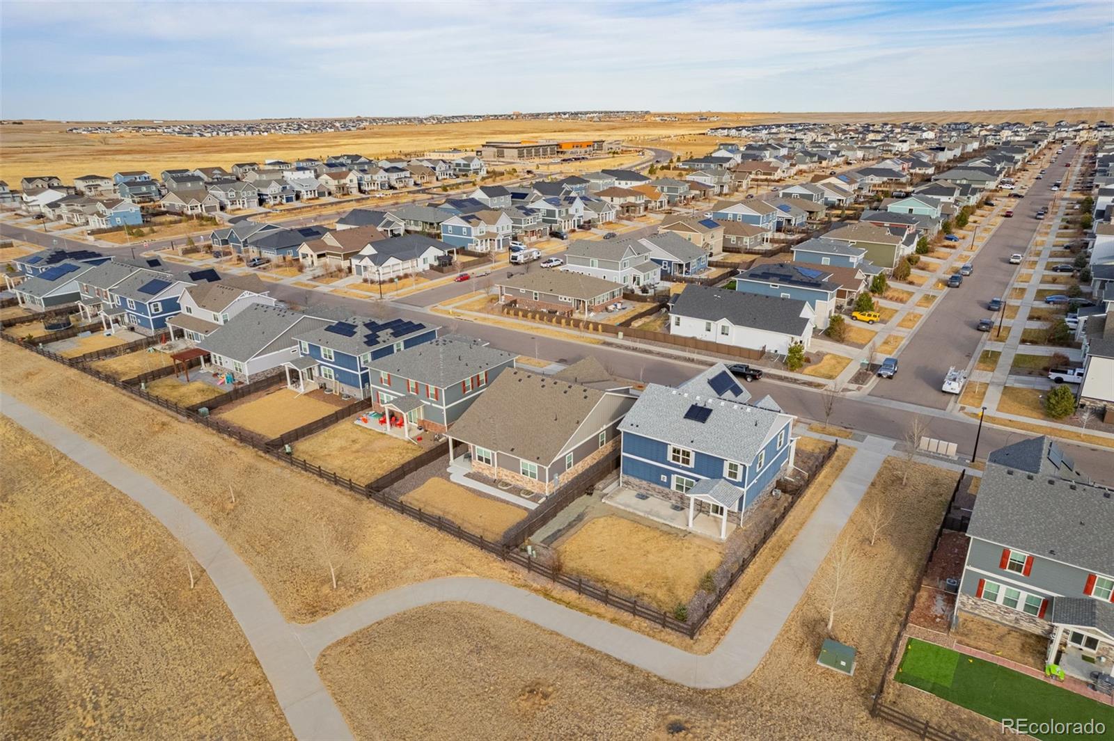 91 South Quantock Street Aurora, CO 80018 - Photo 42 of 45 an aerial view of residential houses with outdoor space